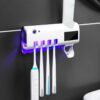 Stérilisateur brosse à dent avec distributeur dentifrice