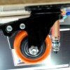 Roues pivotantes en acier à frein Orange PM