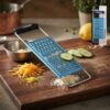Râpe Multifonctionnelle pour Cuisine et Fruits – Acier Inoxydable et Poignée Ergonomique